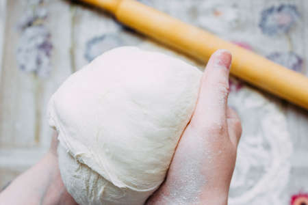 DIY pizza. homemade pizza step by step instruction.pizza step 1 roll out the pizza dough.の写真素材