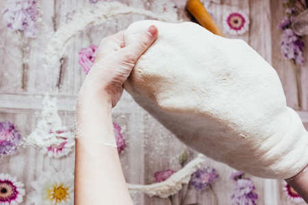 DIY pizza. homemade pizza step by step instruction.pizza step 1 roll out the pizza dough.の写真素材