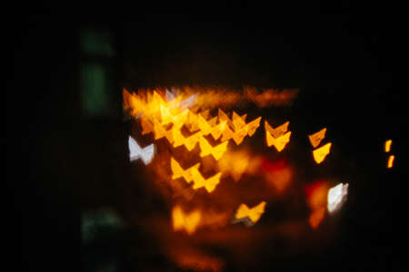 Multicolour bokeh butterfly shape ,the art from night lights.