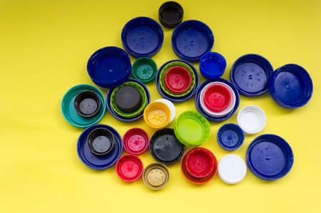 many colorful bottle caps.separate garbage collection. plastic sorting.の写真素材
