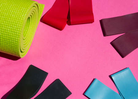 home sports equipment. Fitness and pilates gum. Pilates equipment flatly. Elastic expander. Sport and health concept.love sport.の写真素材