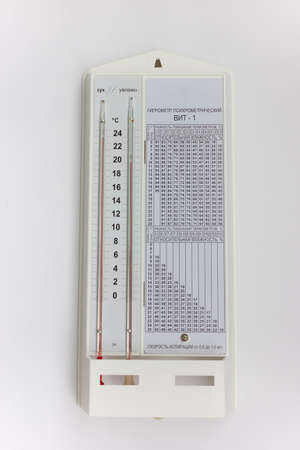Psychrometric hygrometer isolated on white background.simple device for measuring air humidity in a...