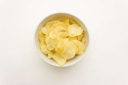 plate with chips on a white background top viewの写真素材