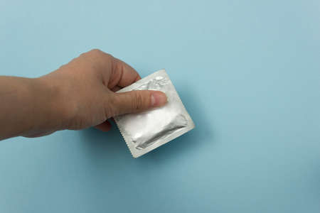 the international contraception day on September 26. the condom in the package and a bananaの写真素材