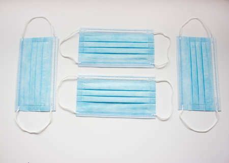 Medical protective mask on white background, top view. Health care