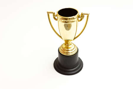 golden cup trophy isolated on white backgroundの写真素材