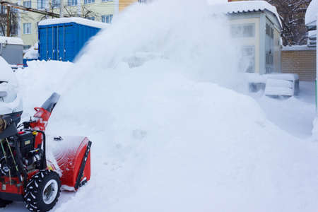 Cheboksary,Russia-january 20 2021:snow removal with Husqvarna ST276EP. snow removal with snowplow.abnormal amount of snowのeditorial素材