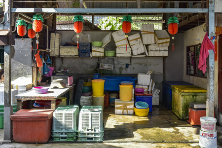 Warehouse and back of the shop with containers and boxes of goods to be sale to customer, Penang, Malaysiaの写真素材