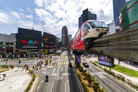 KUALA LUMPUR, 29 July 2018 - The monorail train runs, operates at the Bukit Bintang station in front the Lot 10 shopping mall, Malaysiaのeditorial素材