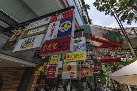 KUALA LUMPUR, 29 July 2018 - View of the restaurants advertisement on the Bukit Bintang street for restaurant inside the Lot 10 shopping mall where are served Chinese foodsのeditorial素材