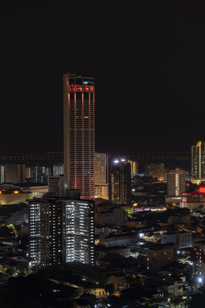 Aerial view of Penang night cityscape with illuminated  building and busy circulation streetsの写真素材