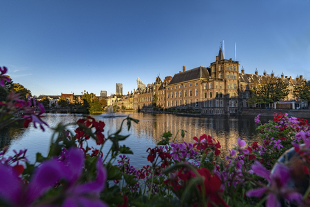 Reflection of the Buitenhof, Binnenhof buildings, Dutch parliament campus under a clear blue sky in The Hague, Netherlandsのeditorial素材