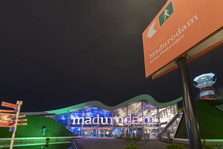 THE HAGUE, 27 March 2019 - Front view of Madurodam miniature, the  park that shows most of the Dutch monuments under a clear water at night, Netherlandsのeditorial素材