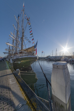 THE HAGUE, 21 June 2019 - Belem, antique French tall ship, vessel docking at  the harbor of The Hague, Scheveningen under a sunny and blue skyのeditorial素材