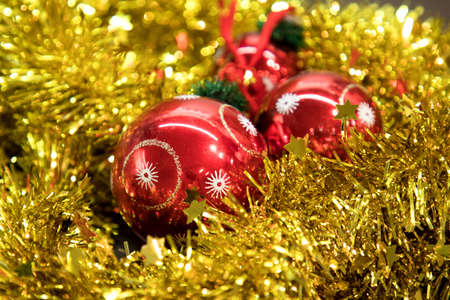 Christmas red balls in winter setting. Xmas ball abstract background. Winter holidays concept.