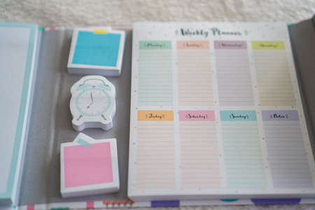 colorful planner and notebook on a white backgroundの写真素材