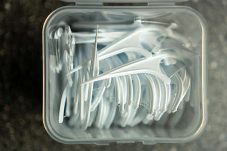 white floss sticks in the boxの写真素材