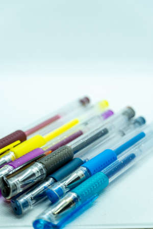colored gel pens on white backgroundの写真素材