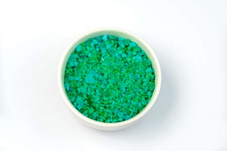 green mint sea bath salt in a white bowl