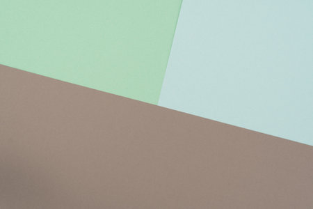 interesting background folded of colored paper leaves of different colorsの写真素材