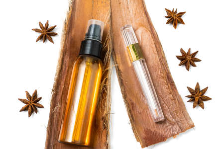 Argan oil and eyelash repair on palm tree pieces and star anise