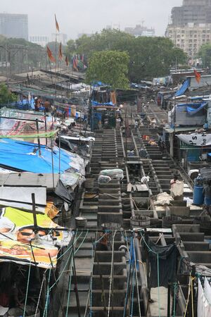 MUMBAI - JUNE 24: People at Dhobi Ghat, the worldのeditorial素材