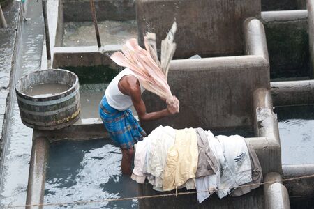 MUMBAI - JUNE 24: People at Dhobi Ghat, the world