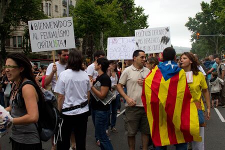 BARCELONA-JUNE 19: Manifestation in Placa Catalunya against the government measures in the economical crisis. Barcelona, Spain on 19 June 2011のeditorial素材