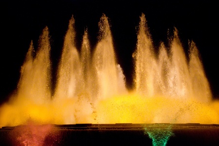 BARCELONA - JULY 25: Tourists at the Magic Fountain of Montjuïc (Font màgica de Montjuïc) and Palau Nacional on the Montjuïc, near Plaça d'Espanya on July 25, 2011 in Barcelona, Spainのeditorial素材