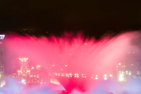 BARCELONA - JULY 25: Tourists at the Magic Fountain  and Palau Nacional on the Montju&iuml,c, near Pla&ccedil,a d'Espanya on July 25, 2011 in Barcelona, Spainのeditorial素材
