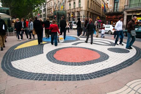 BARCELONA - MAY 14  Pavement mosaic by Joan Mir— on la Rambla, Barcelona, Catalunia, Spain on 14...