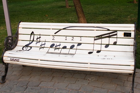 SANTIAGO - JANUARY 20  Painted benches by different artists on Isidora Goyenechea street in El Golf neighbourhood on January 20, 2013 in Santiago, Chileのeditorial素材