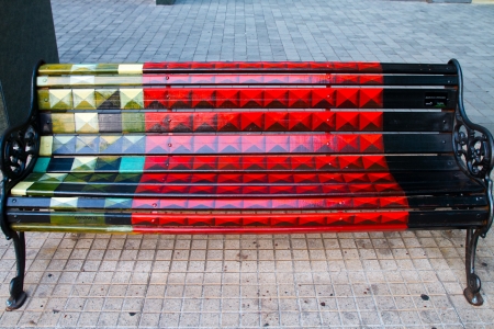 SANTIAGO - JANUARY 20  Painted benches by different artists on Isidora Goyenechea street in El Golf neighbourhood on January 20, 2013 in Santiago, Chileのeditorial素材