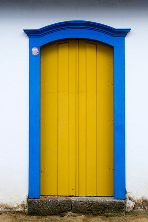 PARATY, BRAZIL - JANUARY 24: Typical historical colourful wood doors in the colonial downtown of Paraty, Rio de Janeiro, Brazil on January 24th, 2016のeditorial素材