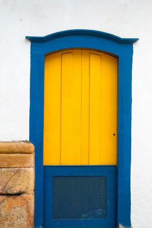 PARATY, BRAZIL - JANUARY 24: Typical historical colourful wood doors in the colonial downtown of Paraty, Rio de Janeiro, Brazil on January 24th, 2016のeditorial素材