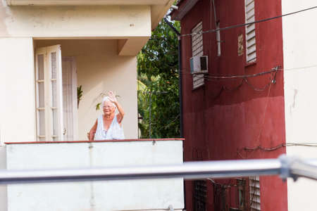 HAVANA - APRIL 27, 2016: People, cars and buildings in Old Havana (Havana Vieja)のeditorial素材