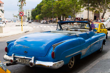 HAVANA - APRIL 27, 2016: People, cars and buildings in Old Havana (Havana Vieja)のeditorial素材