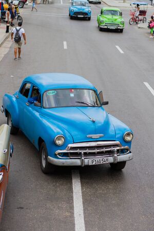 HAVANA - APRIL 27, 2016: People, cars and buildings in Old Havana (Havana Vieja)のeditorial素材