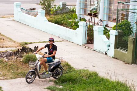 HAVANA - APRIL 27, 2016: People, cars and buildings in Old Havana (Havana Vieja)のeditorial素材