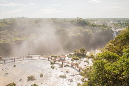 View of the Iguazu Iguacu) falls, the largest series of waterfalls on the planet, located between Brazil, Argentina, and Paraguay. At some times during the year one can see as many as 275 separate waterfalls cascading along the edges of 2,700 meters (1.6 のeditorial素材