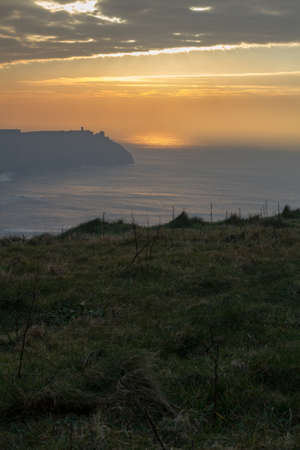 Beautiful landscape at the famous Cliffs of Moher and  O'Brien's Tower in Co. Clare, Europe, irelandの写真素材