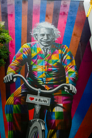 SAO PAULO - APRIL 10: Streetart work by Brazilian artist Kobra, representing Einstein on a bike and...