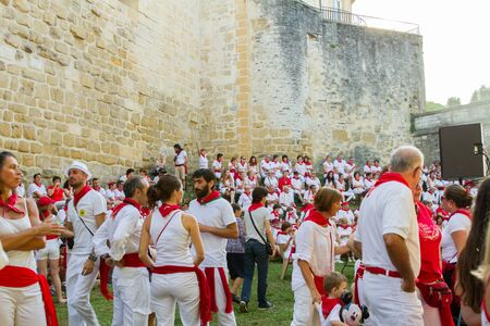 BAYONNE, FRANCE - JULY31: Unknown people dresses in traditional red and white clothes enjoying the "Fetes de Bayonne" festivals in the Northern Basque Country in the town of Bayonne, France on July 31st, 2017のeditorial素材