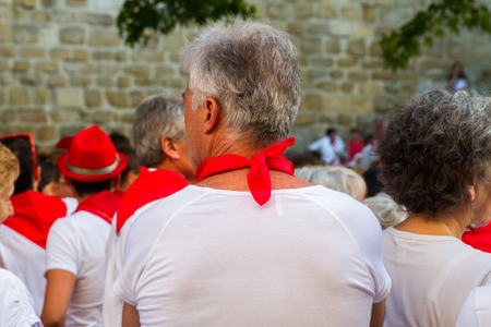 BAYONNE, FRANCE - JULY31: Unknown people dresses in traditional red and white clothes enjoying the "Fetes de Bayonne" festivals in the Northern Basque Country in the town of Bayonne, France on July 31st, 2017のeditorial素材