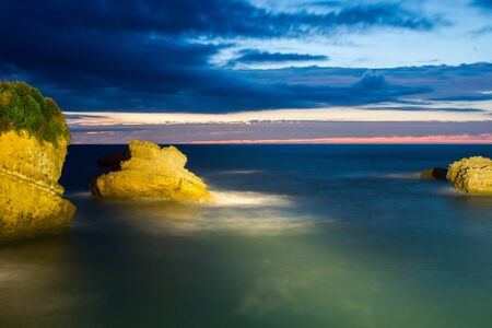 Sunset reflection in the water in Biarritz, France, Bay of Biscayの写真素材