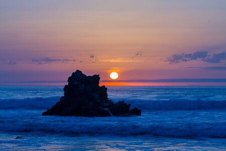 Sunset reflection in the ocean on Arrietara beach, Atxabiribil Sopelana, Basque Country (Euskadi), Spainの写真素材
