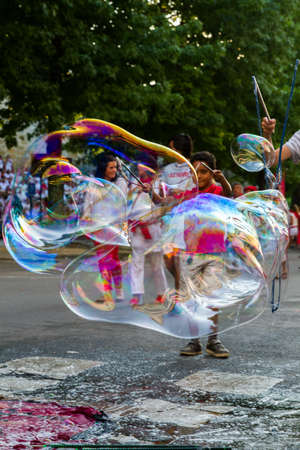 BAYONNE, FRANCE - JULY31: Unknown people dresses in traditional red and white clothes enjoying the "Fetes de Bayonne" festivals in the Northern Basque Country in the town of Bayonne, France on July 31st, 2017のeditorial素材