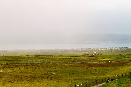Beautiful landscape at the famous Cliffs of Moher and  O'Brien's Tower in Co. Clare, Europe, irelandの写真素材