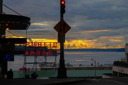 SEATTLE, WASHINGTON STATE -  JANUARY 2019 - View of Pike Place Public Market at sunset, overlooking...