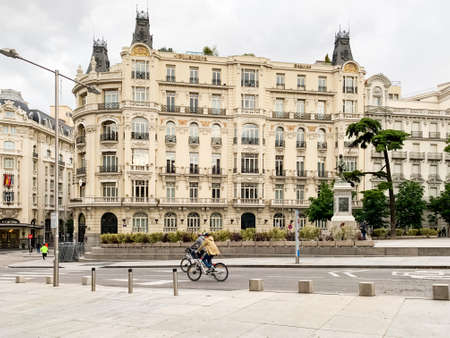 Madrid, Spain - May12-19 2020: Madrid street life, with people and buildings  after the total...